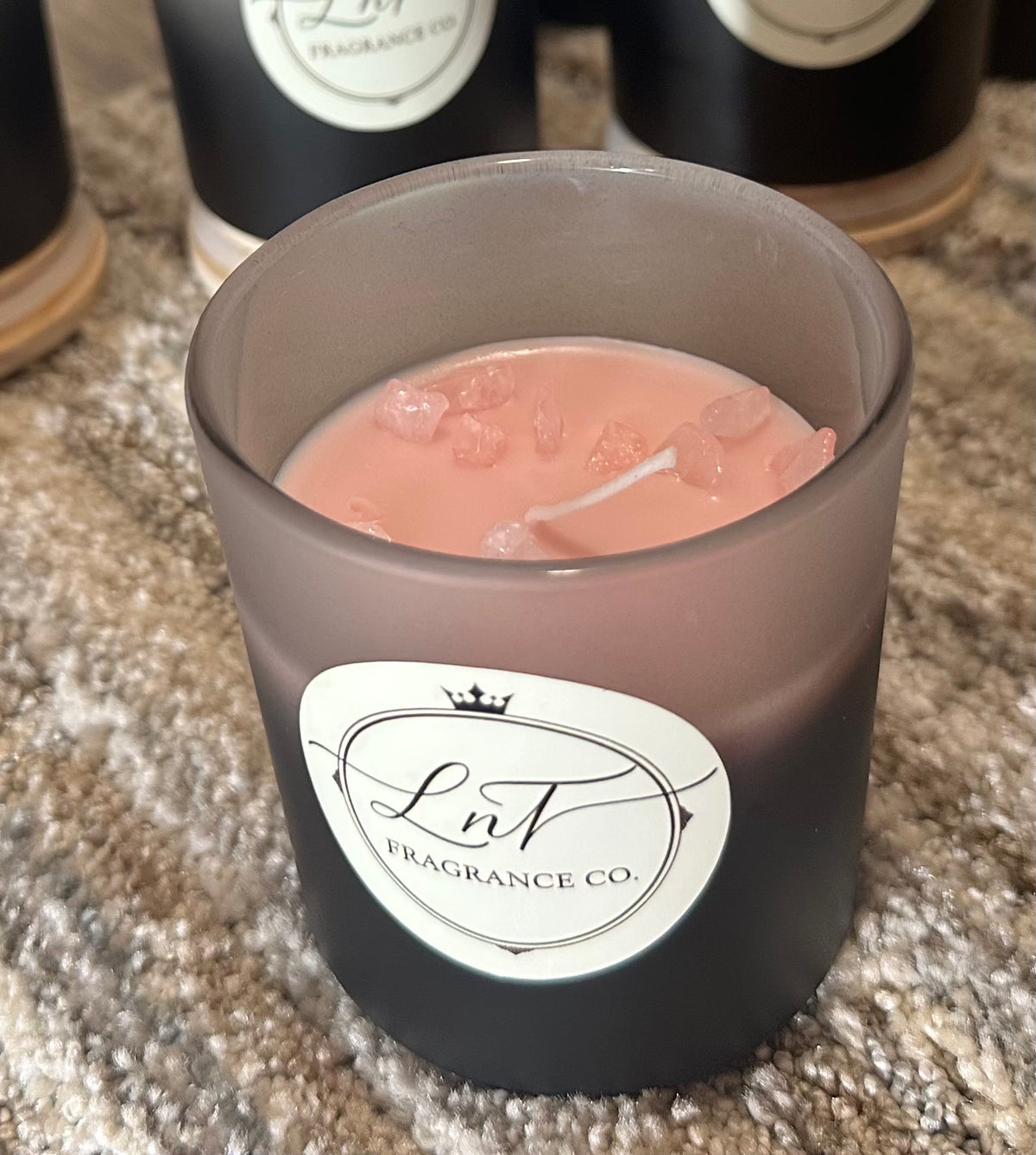 Clarity 10 oz soy wax candle with rose quartz, rose petals, and L&T Fragrance Co. label